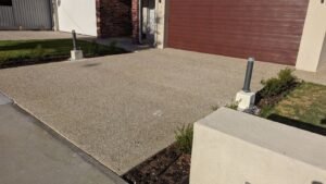 Exposed aggregate concrete driveway by Caboolture Concreters, decorative concrete contractors in Caboolture QLD